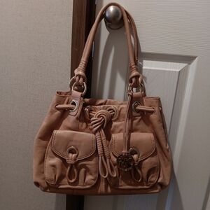 Michael Kors Tan Leather Tote Bag defect in the strap but it doesn't prevent any